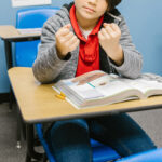 boy mad at desk, Conduct Disorder Self Test, Kalamazoo, MI